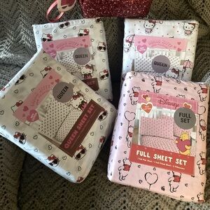 Choice of 3 sets queen size Hello Kitty sheets or 1 full-size Disney brand new.